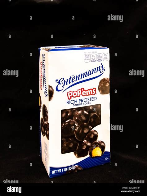 A Box Of Entenmanns Rich Frosted Popems Donut Holes With A Chocolate