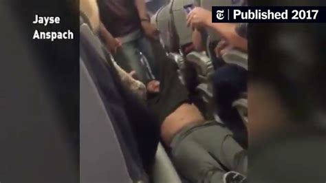 united airlines passenger is dragged from an overbooked flight the new york times