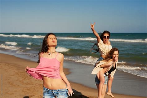 Three Friends Having Fun On Beach By Stocksy Contributor Guille Faingold Stocksy
