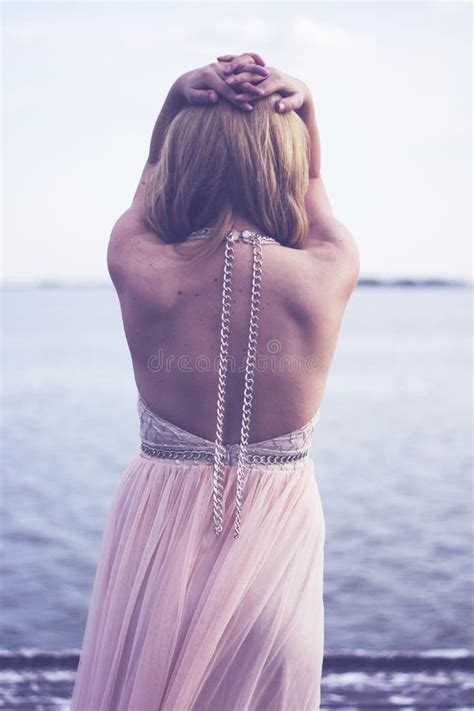 Back Of Blond Woman In Evening Gown Posing Stock Image Image Of