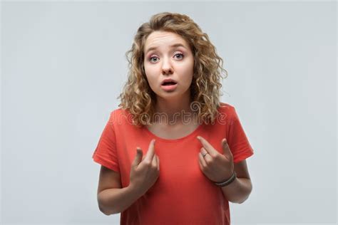 Photo Of Indignant Blonde Teen Pointing Finger At Herself Has