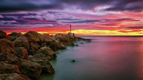 Sunset Over The Mediterranean Sea Valencia Spain Wallpaper Backiee