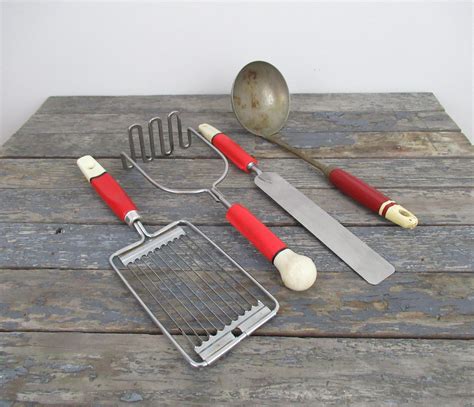 Aside from their aesthetic appeal, many of these items are still usable, which makes them both functional to use and fun to own. Retro Kitchen Utensils http://etsy.me/2o4bzbm #housewares ...