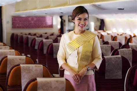 Thai Airways Cabin Crew Smile All The Times พนักงานต้อนรับบนเครื่องบิน