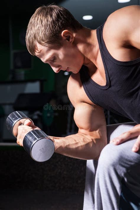 Close Up Bodybuilder Doing Concentration Curls Stock Photos Free
