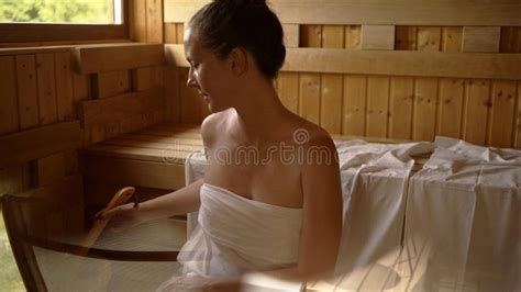 Woman Relaxing And Sweating In Hot Sauna Stock Photo Image Of People Long