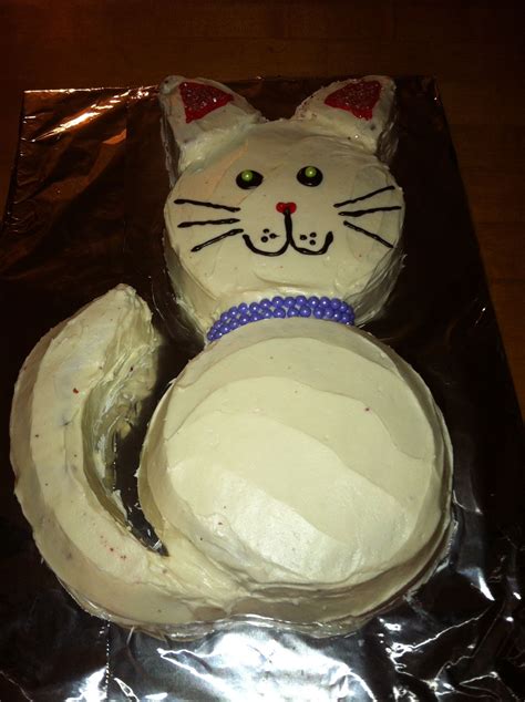 A Homemade Cat Cake Made From 3 Round Cake Pans Two For The Body One