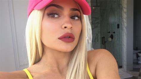 Kylie Jenners Yellow Bikini — See Sexy Pics And Vote For Your Fave