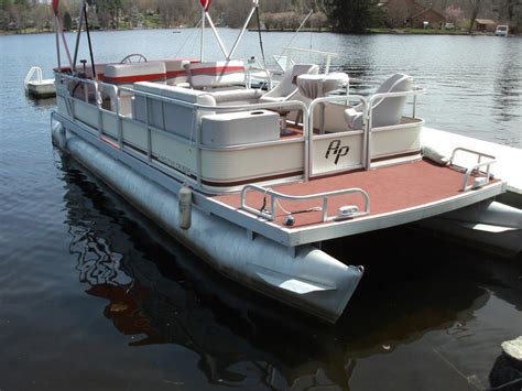 Let our qualified staff help you with all your boating or pontoon needs. 1988 Godfrey 24 Aqua Patio powerboat for sale in Massachusetts