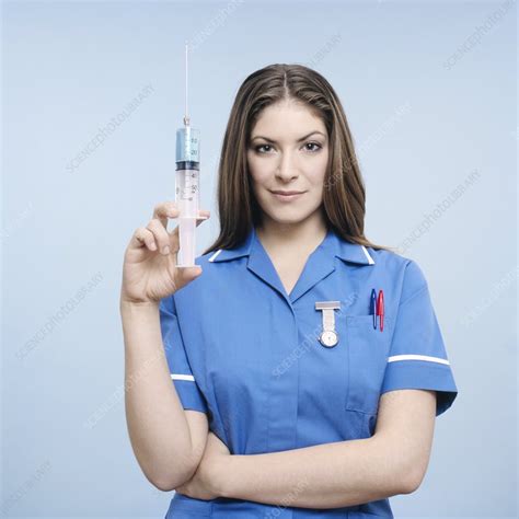Nurse With Syringe Stock Image C001 2074 Science Photo Library