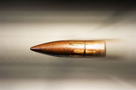 119200 Bullet Going Through Stock Photos Pictures And Royalty Free