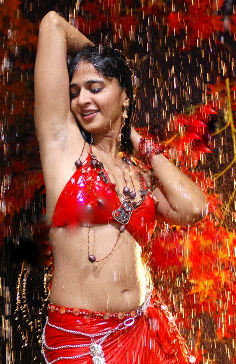 indian hot actress telugu actress anushka shetty hot and wet in red dress showing her sexy