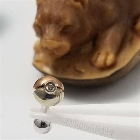 Log in to add custom notes to this or any other game. This Solid Gold Pokeball is ready for for a rook or navel piercing! @safepiercing #safepiercing ...