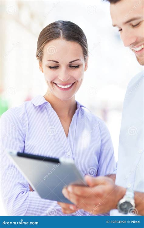 Business People Using Digital Tablet Together Stock Photo Image Of