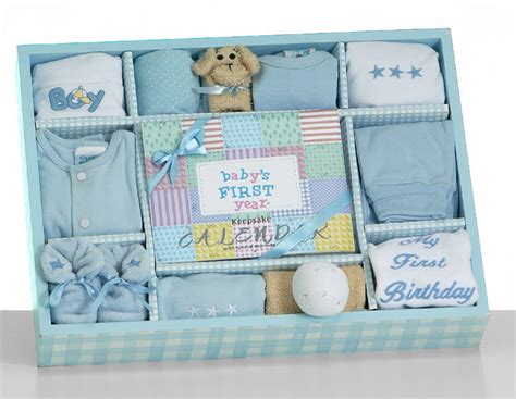 Plush teddy bears for the little tyke to cuddle, the softest of personalized baby blankets, and picture frames for the nursery will make your present a standout at the baby shower. Baby Boy Gift | My First Year Gift Set