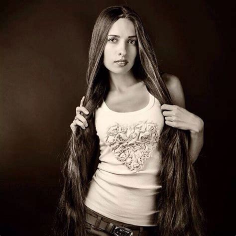 With long hair, the options are endless. Long hair girl shows off her floor length hair|Girls with ...
