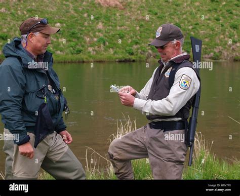 Fish Game Officer Fishingmans License By The Ayakulik River Hi Res