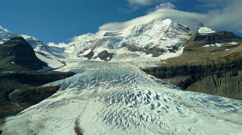 Robson Glacier Flowing Down From Mt Robson On The Right