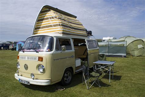 The Campervan Is Equipped With A Pop Up Roof Which Is Raised During Camping She Seats