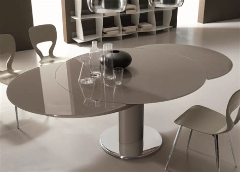 From prominently recognized italian designer, connubia, the giove round extending table features a simple extension to turn this circular design into a table for six. Extending Dining Room Tables Uk • Faucet Ideas Site