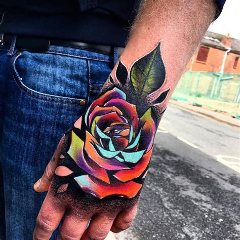 Tattoos are a form of body modification, made by inserting indelible ink into the dermis layer of the skin to change the pigment. Pop art rose tattoo on the left hand. Swollen day after