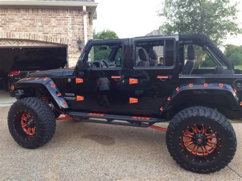 Custom Black Jeep With Orange Highlights One Of A Kind