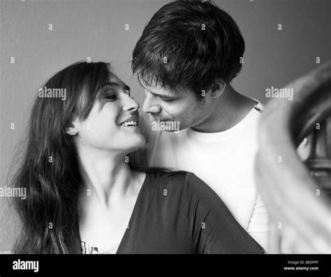 Young Couple Kissing Stock Photo Alamy