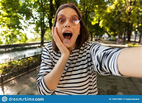 Beautiful Excited Shocked Woman Outdoors Take A Selfie By Camera Stock