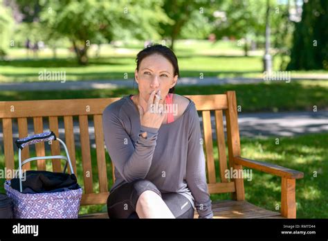 Middle Aged Woman Smoking Cigarette Hi Res Stock Photography And Images