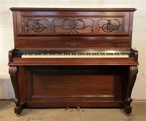 Strohmenger Upright Piano For Sale With A Chippendale Style Mahogany