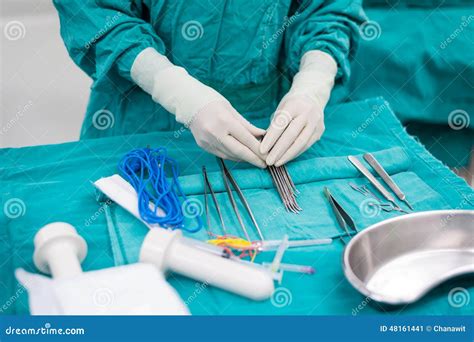 Scrub Nurse Prepare Medical Instruments For Surgery Stock Image Image