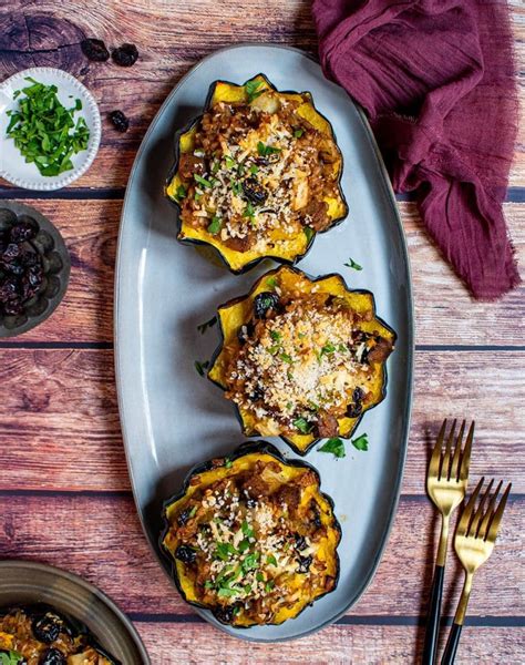 Stuffed Acorn Squash With Sausage And Apple Farro Stuffing Cherry On