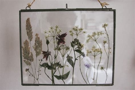 Maybe you would like to learn more about one of these? A handmade cottage: Pressed wild flowers in glass frames