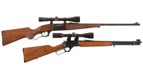 Two Lever Action Rifles With Scopes Rock Island Auction