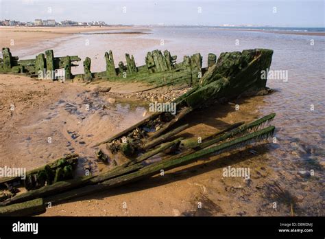 Historic Wreck Wooden Boat Shipwreck Uncovered By The Sea At Seaton