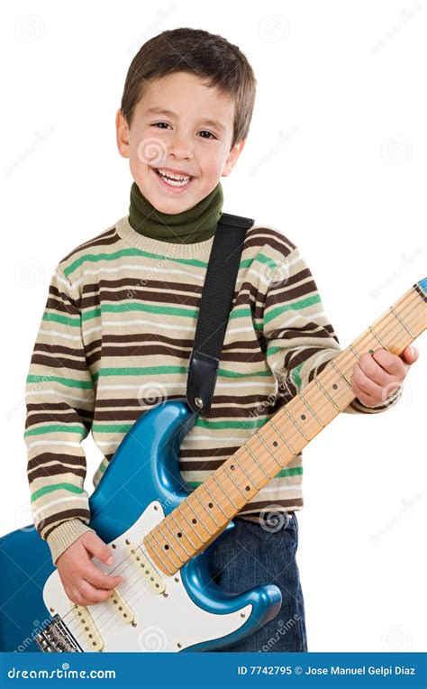 Niño Adorable Que Toca La Guitarra Eléctrica Foto De Archivo Libre De