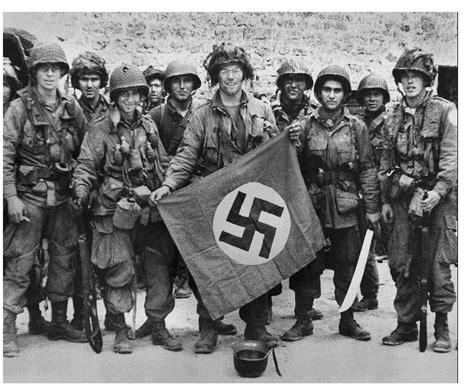 Paratroopers Of The 101st Airborne Division Displaying A Captured Nazi