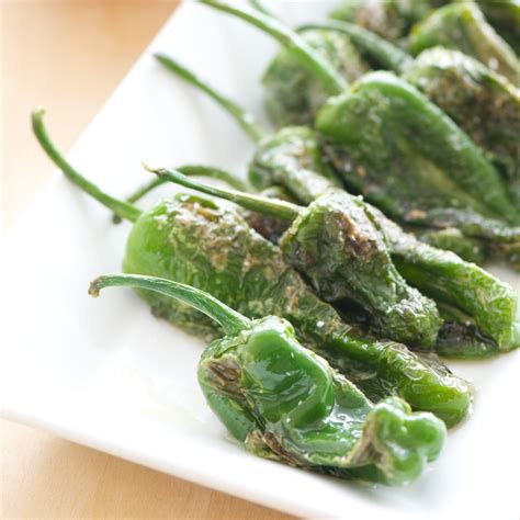 Shishito also tend to be a little shinier. Pan-Fried Padron Peppers — Pixels + Crumbs