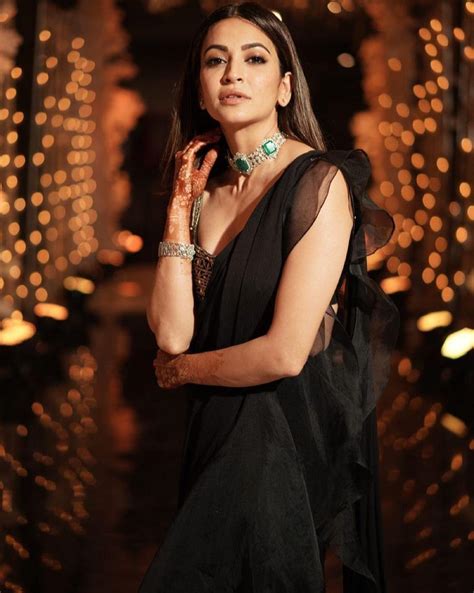 kriti kharbanda is a black beauty in a ridhi mehra saree for a wedding