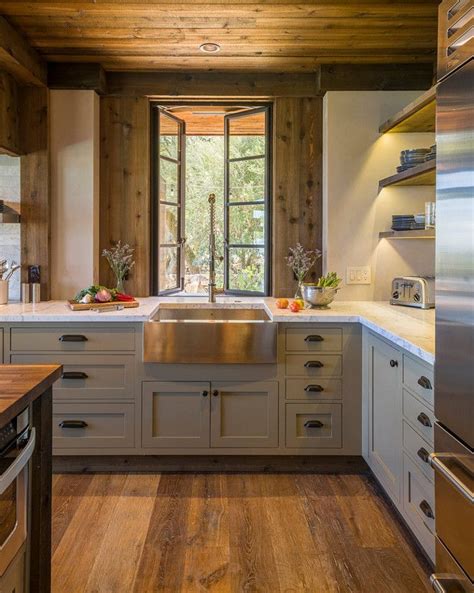 I love rustic vintage things, it's so close to classic farmhouse style. Rustic kitchen with cabinets painted in Benjamin Moore ...
