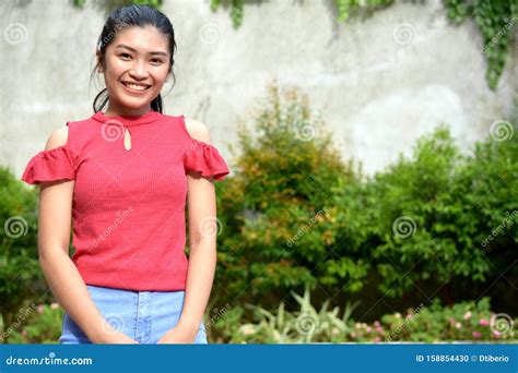 A Smiling Youthful Filipina Female Stock Photo Image Of Females
