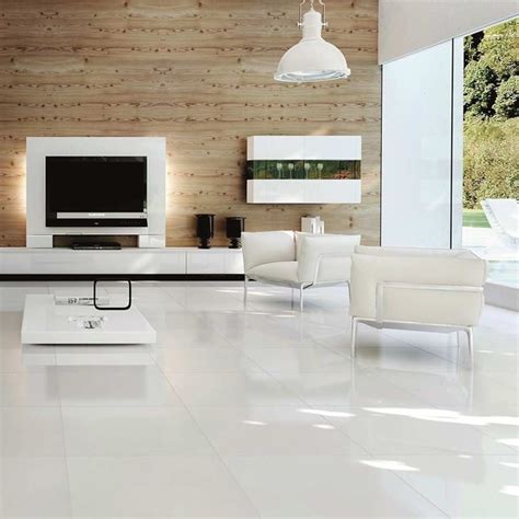 This is a bedroom floor tiles design that has long elongated tiles in a rectangular shape in a colour combination of white and grey. Which ceramic tiles are best for living area in home? - Quora