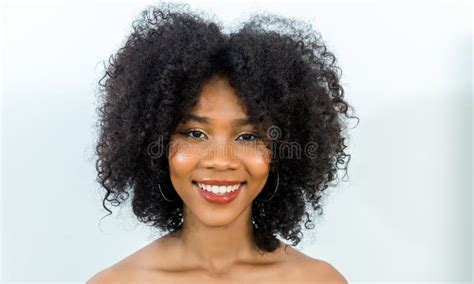 Portrait Of African American Woman With Bushy Curly Hairstyle Stock