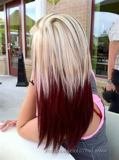 A styling product is applied to highlight the blonde and the sides have a low fade. Black Hair With Highlights Underneath Wallpaper Red Hair ...