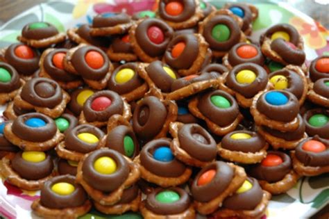 Gather up your group of angels and help them glue a wooden bead to the top of a hershey's® kiss® candy. Hershey's, Twist pretzels and m&m recipe | Chefthisup