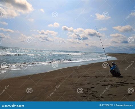 A Sea Fishing Hobbyist On The Beach Stock Photo Image Of Peace Beach