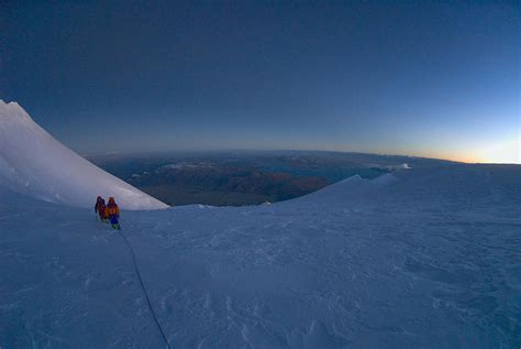 Two Climbers At Sunrise On Gurla Photograph By Jake Norton