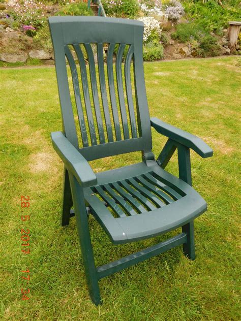 24 twenty four new white standard plastic wrought iron patio chair leg inserts. SOLD - Set of four reclining green plastic garden chairs ...