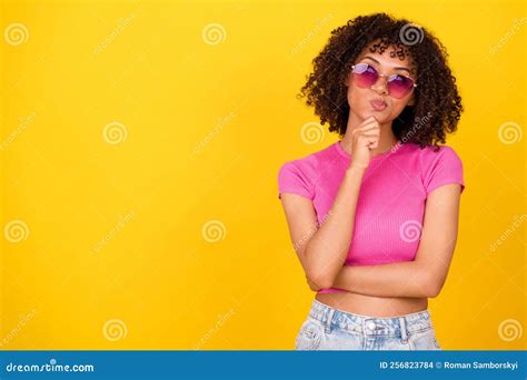 Portrait Of Minded Girl Hand Touch Chin Pouted Lips Brainstorming Isolated On Yellow Color
