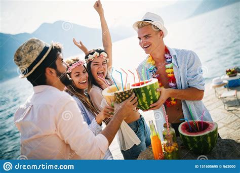 Summer Joy And Friendship Concept With Young People On Vacation Stock